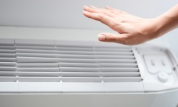 Why is my AC blowing warm air?